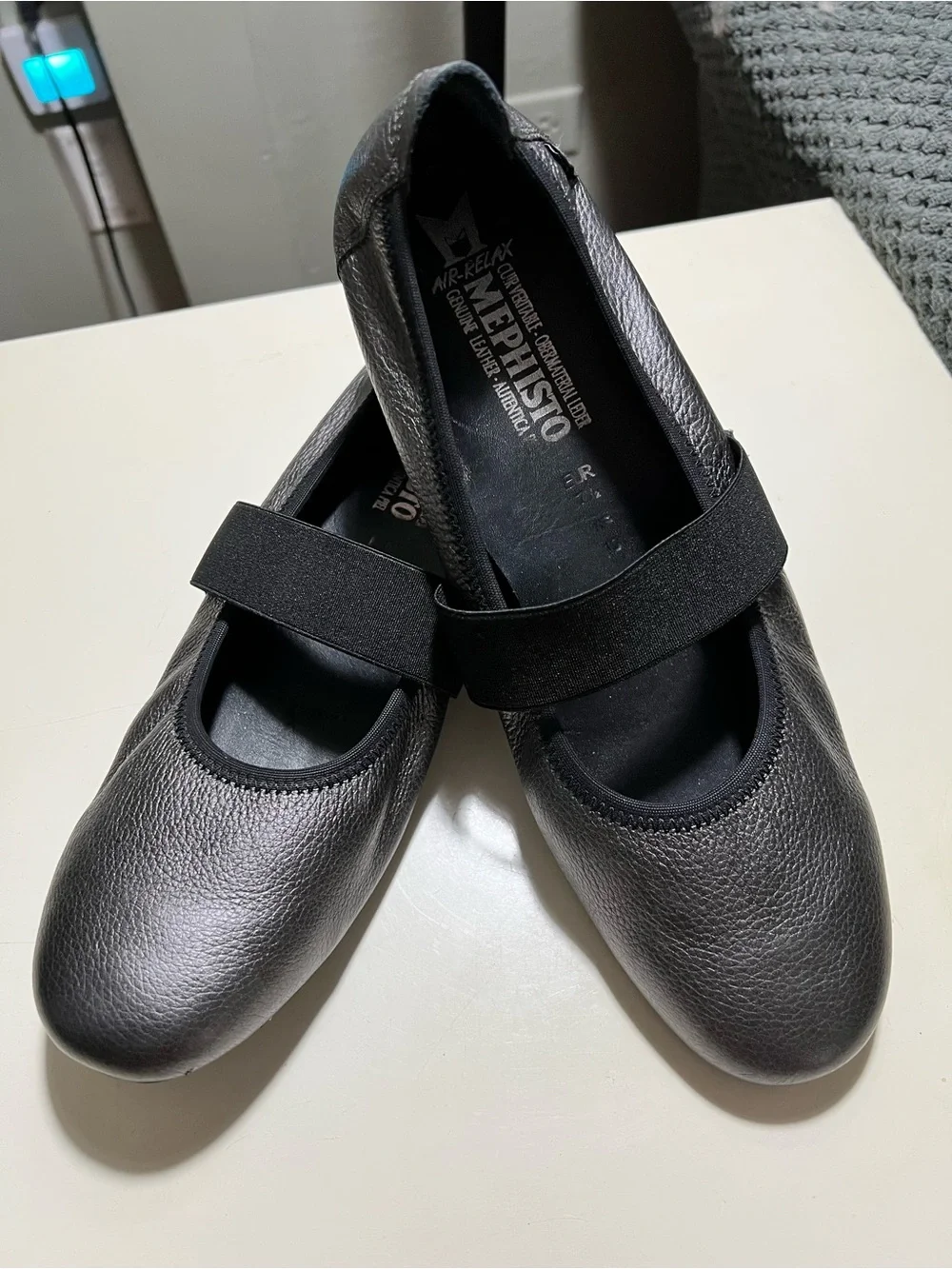 Mephisto metallic gray leather ballet flats/mary Jane’s elastic strap at instep.